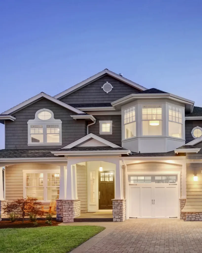 Classic double-storey home with gabled roof and welcoming front porch in a suburban Melbourne setting