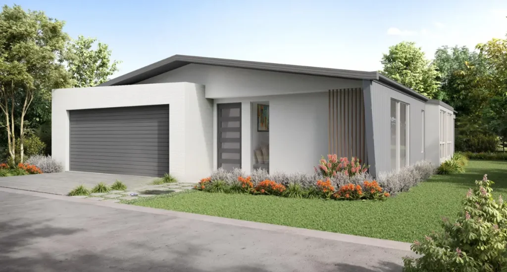 Modern single-story new home with a grey facade, large garage door, landscaped garden beds with colorful flowers.