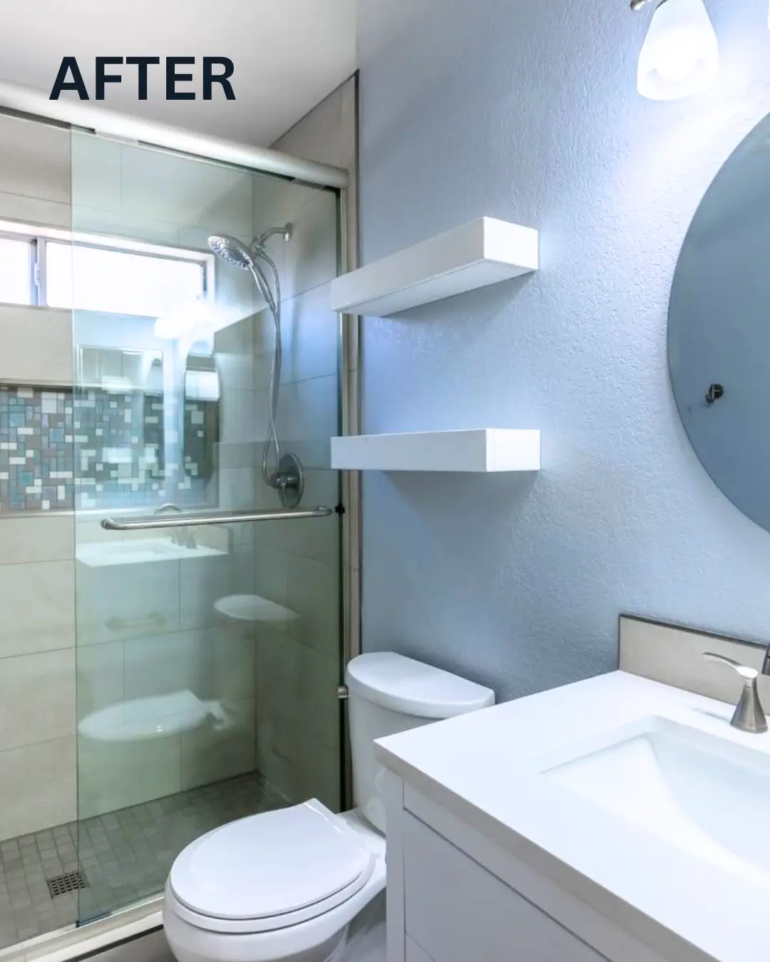 Modern bathroom renovation with walk-in glass shower, floating vanity, and neutral tiles for a clean, high-value flip.