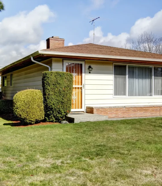 Original single-storey weatherboard home with front lawn, ready for granny flat potential.