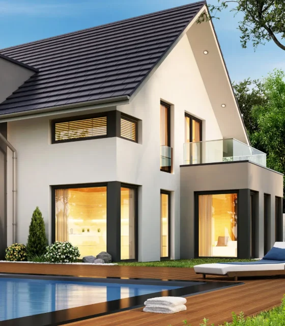 Knockdown rebuild of a modern two-storey home with glass balconies and backyard pool in Melbourne.